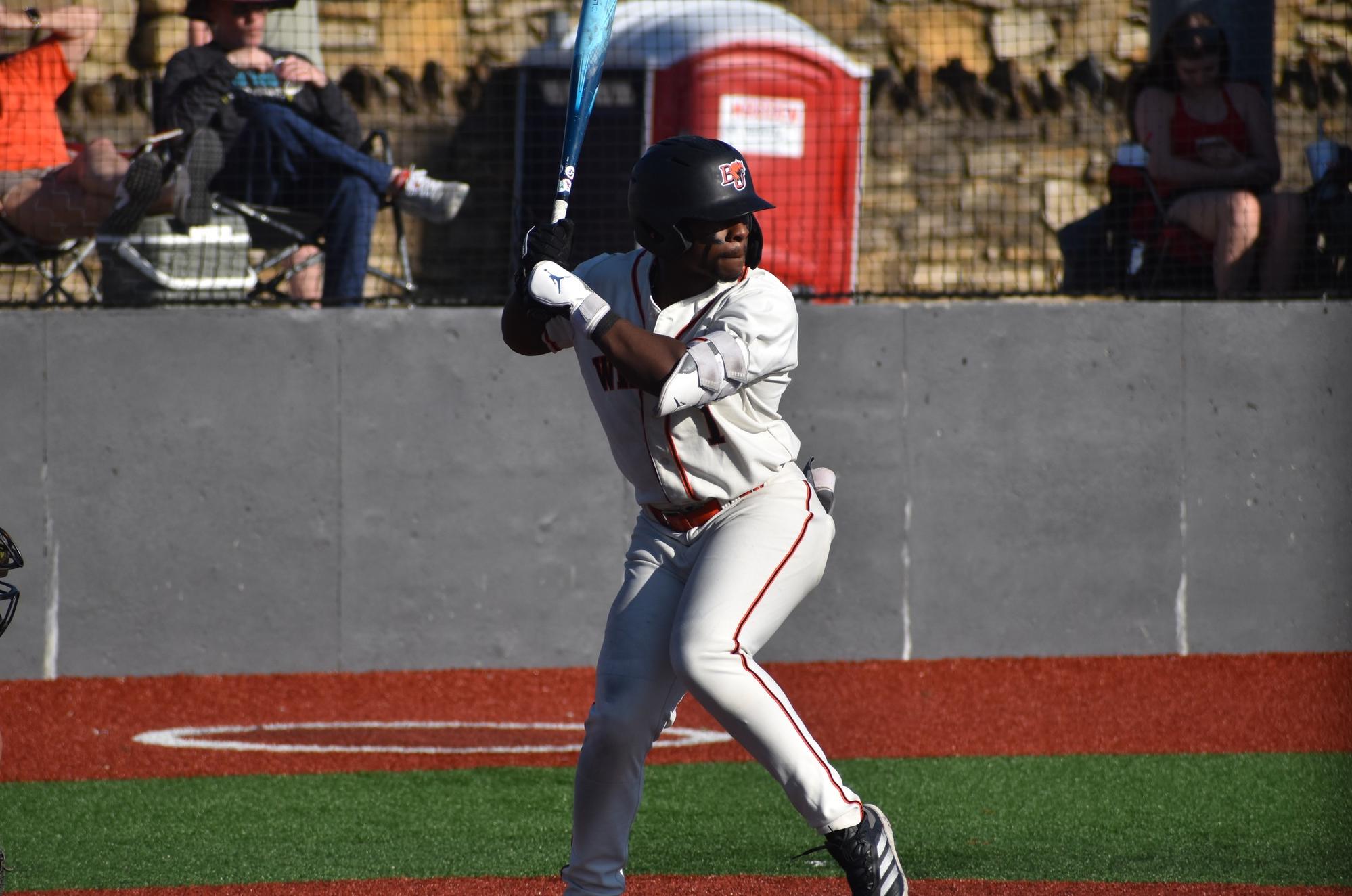 Baker baseball player Tyson Wallace hitting at home against Central Methodist