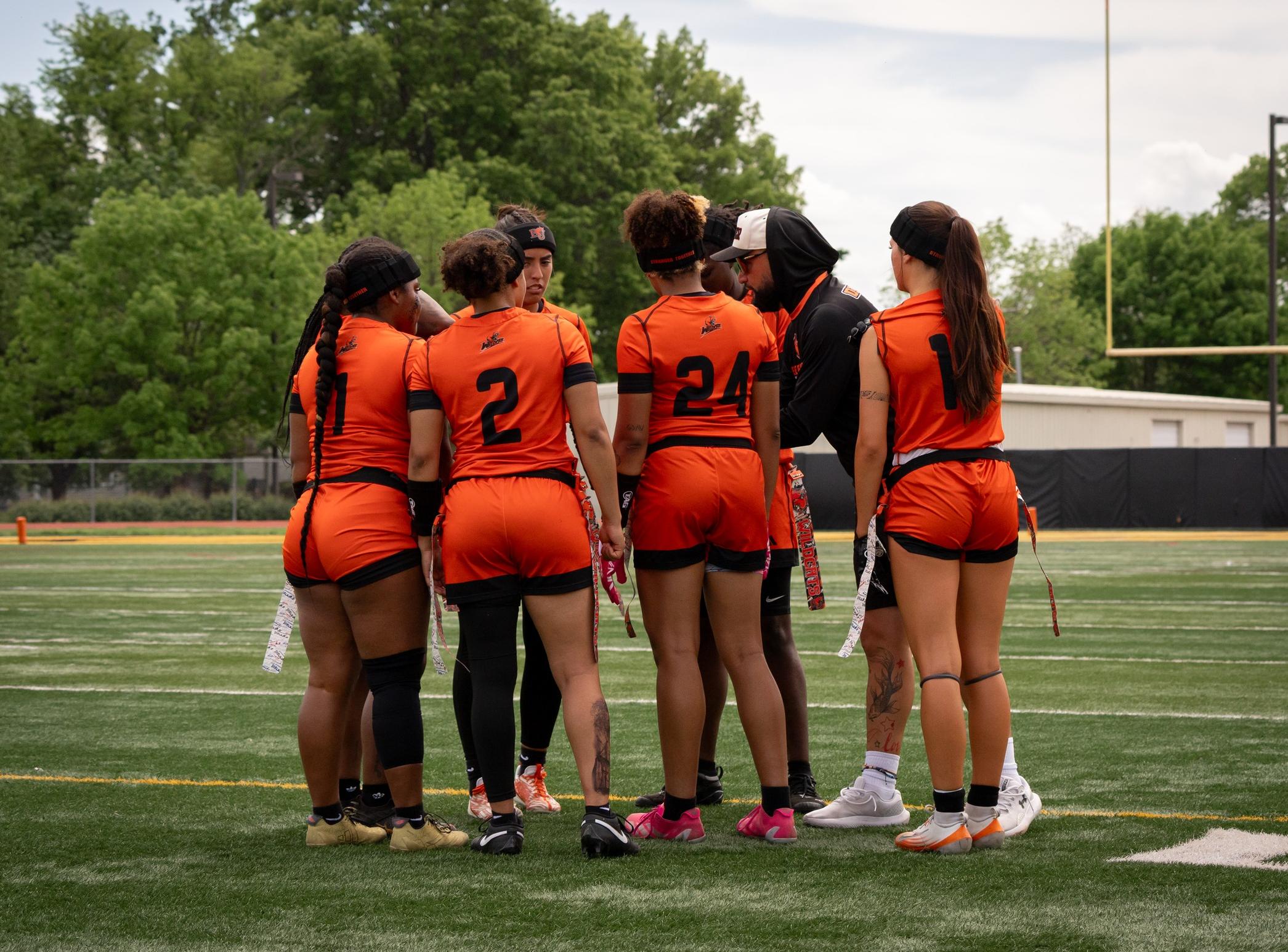 Baker women's flag football huddle