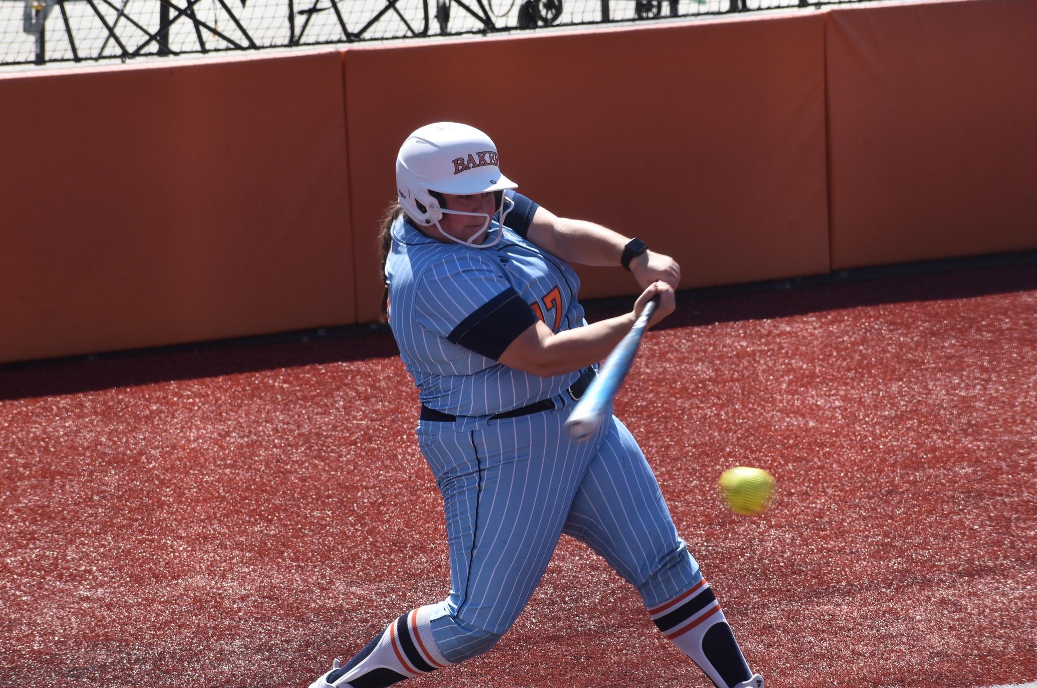 Baker softball player Taryn Hull hitting at home against Culver-Stockton