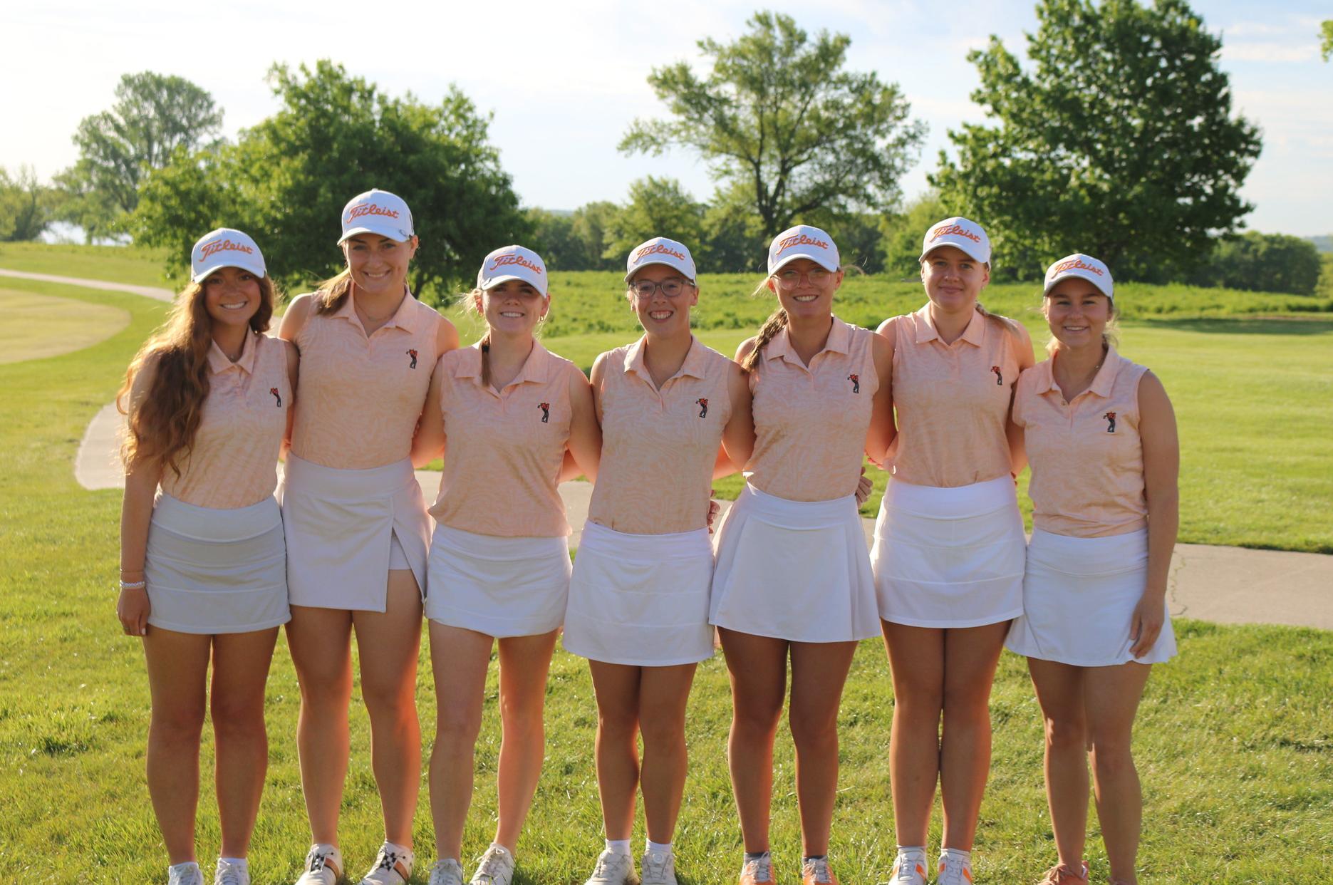 Baker women's golf team at 2026 Heart Championships, from left-to-right, head coach Molly Gonzales, Madison Zubeck, Brooklyn Bowman, Kate Braden, Reagan Kauth, Izabelle Backstrom and Aly Laverty.